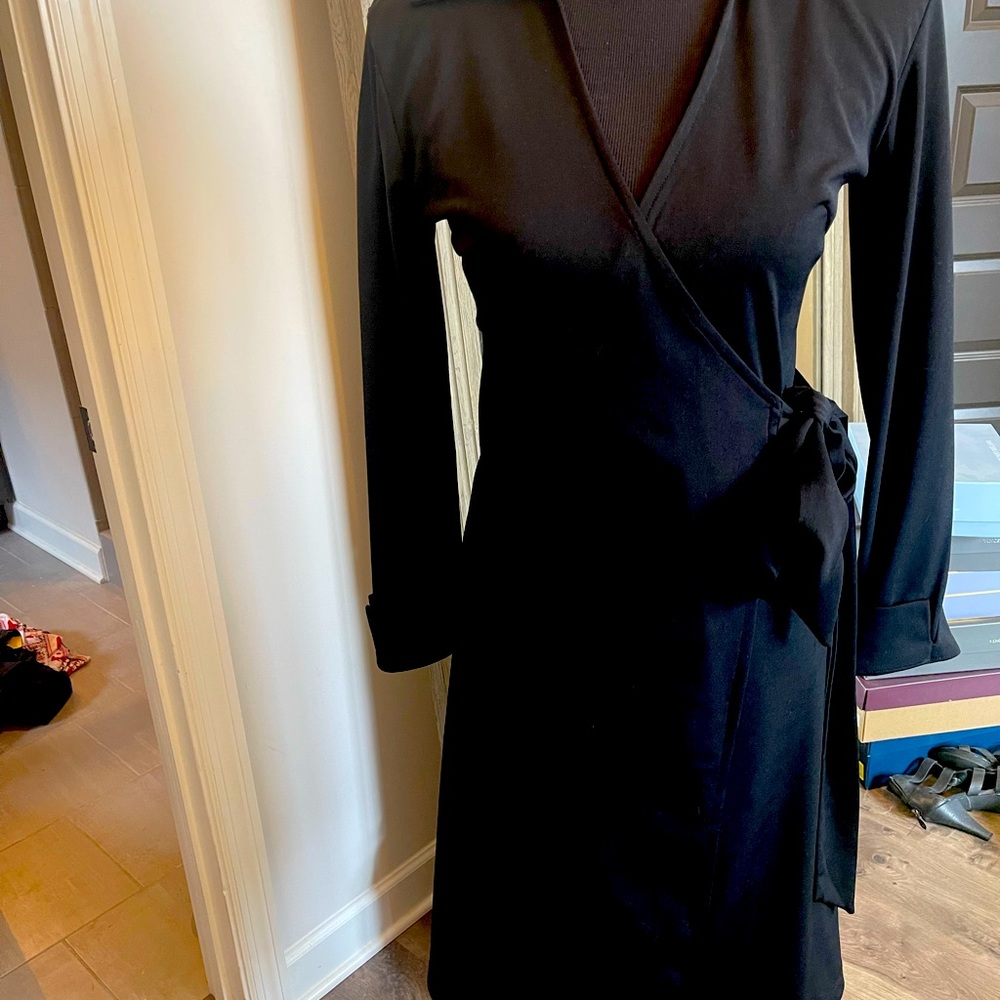 Classic Sexy Diane Von Furstenberg inspired collared wrap dress. Express 3/4